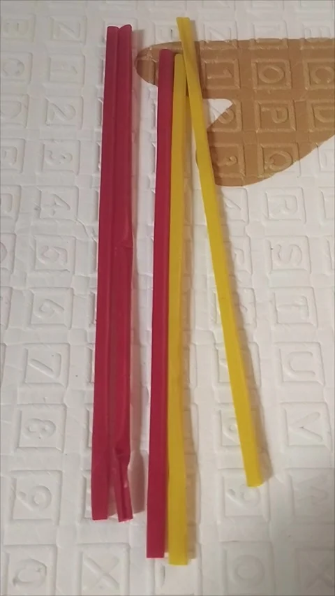 Yellow and red plastic ice pipettes Stock Footage 293988070