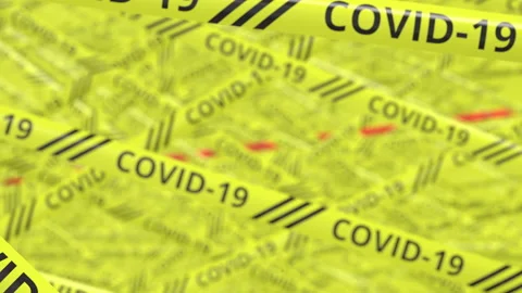 Yellow and red warning tapes with COVID-19 and LOCKDOWN text. Conceptual 3d Stock Footage 140822997