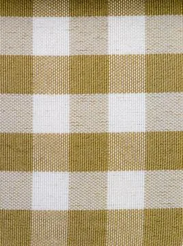 Yellow and white gingham checkered fabric texture close-up Stock Photos