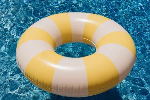 Yellow and White Pool Float Close-Up Stock Photos
