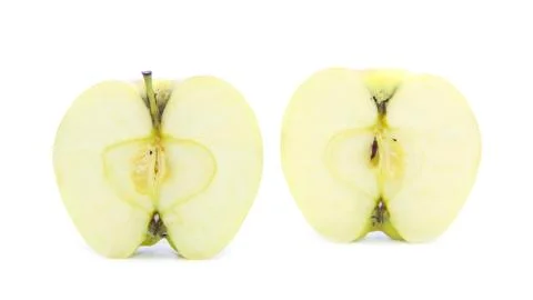 Yellow apple cross section with seed and stick Stock Photos