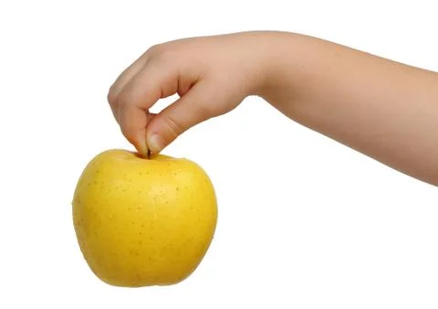 Yellow apple on hand Foto stock