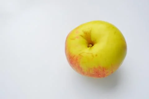 Yellow apple on a white background. Isolate. Fotos de archivo