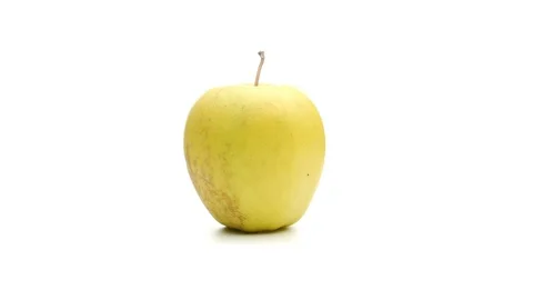 Yellow apple on white background rotating 360 degrees seamless loop 4k Stock Footage 105929942