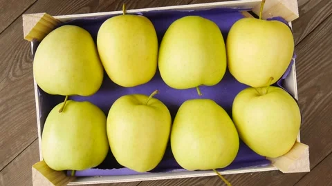 Yellow apples on the table. Stock Footage 246469376