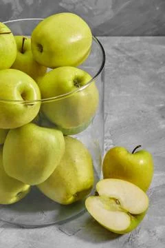 Yellow apples on the table. Top view with copy space on gray stone background. Stock Photos
