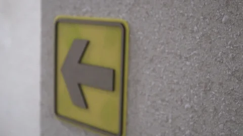 The Yellow Arrow On A Wall Specifies The Direction Of The Movement Video stock 113817571