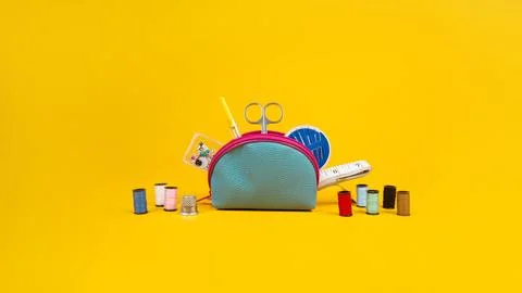 Yellow background. Banner on the theme of needlework. Items needed for sewing Stock Photos