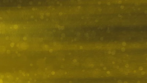 Yellow background features scattering particles and blurred lights Stock Footage 295724016
