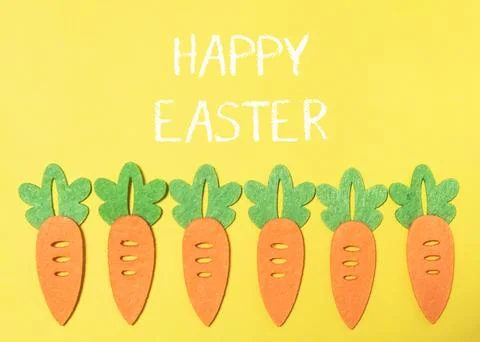Yellow background with a group of carrots Stock Photos