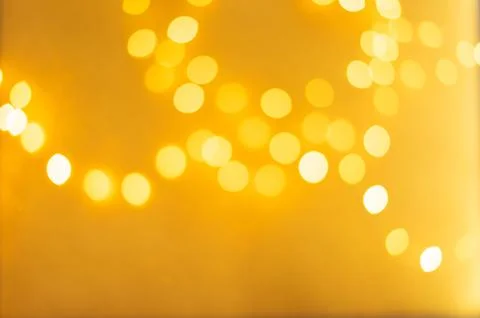 A yellow background with many small circles Stock Photos