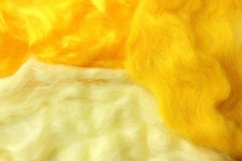 Yellow background with texture of light wool curls Foto stock