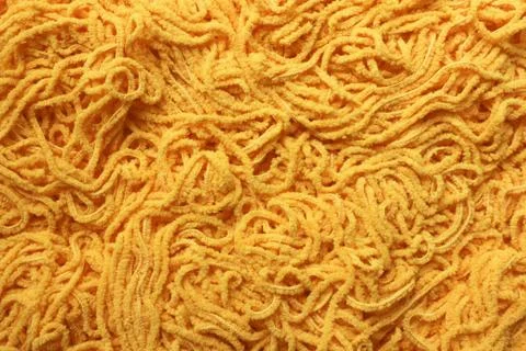 Yellow background with texture of yarn Stock Photos
