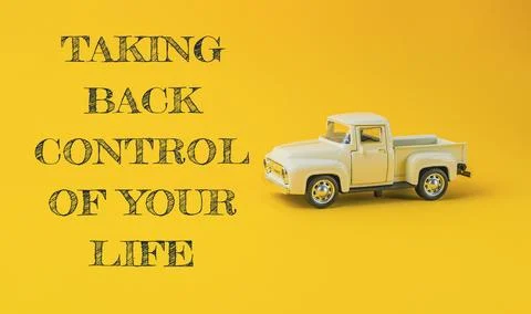 A yellow background with the words taking back control of your life Foto stock
