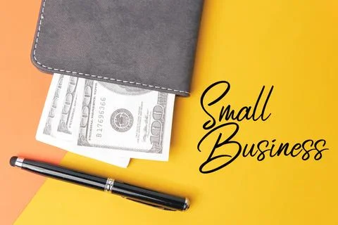 Yellow background written with text SMALL BUSINESS Foto stock