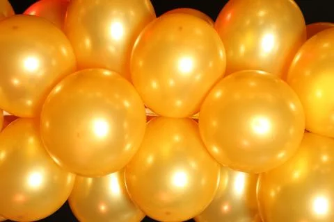 Yellow balloons. Close up Stock Photos