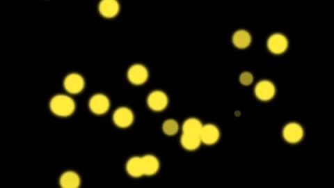 Yellow balls with neon effect falling on black background Stock Footage 263688850