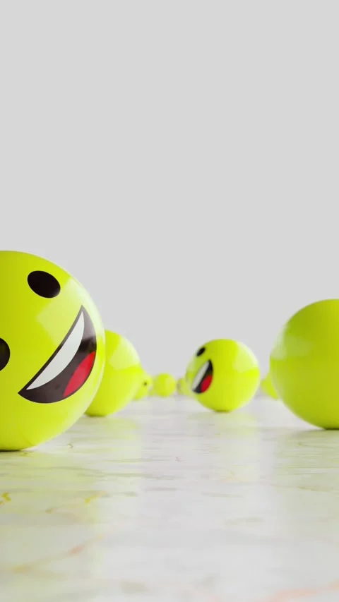 Yellow balls with smiley faces rolling across the endless floor. Vertical looped Stock Footage 307011718