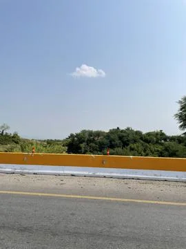 The Yellow Barrier and the Single Cloud Stock Photos