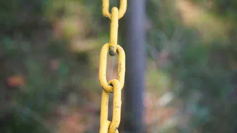 Yellow barrier chain in closeup Stock Footage 116658821