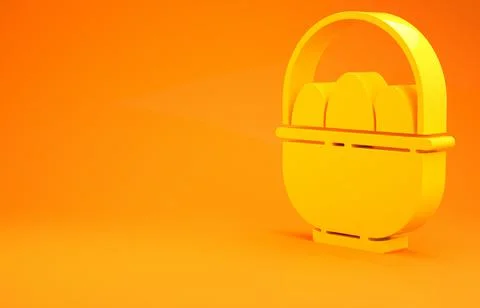 Yellow Basket with easter eggs icon isolated on orange background. Happy East 스톡 일러스트