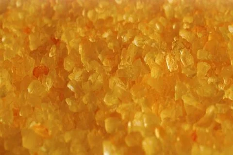 Yellow bath salt closeup Stock Photos