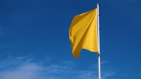 Yellow Beach Flag In Wind Bathing With Caution Slow Stock-Footage 99352295