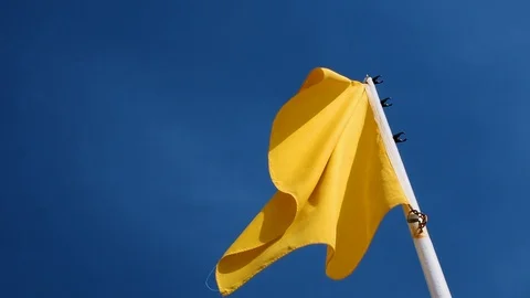 Yellow Beach Flag In Wind Bathing With Caution Slow 2 Stock Footage 99352439