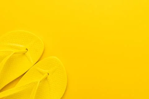 Yellow beach flip-flops Stock Photos