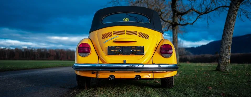 Yellow Beetle 1973 in a field Stock Photos