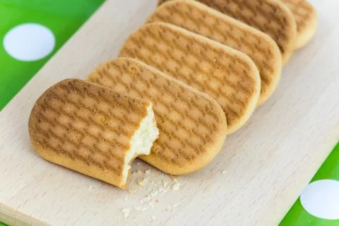 Yellow biscuits on the pile Stock Photos