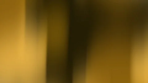 Yellow black gradient creates a blurred background of brown and yellow. Stock Footage 302295087