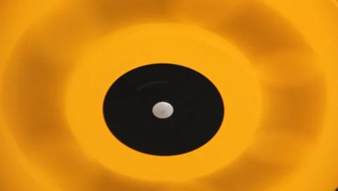 Yellow &amp; Black Spinning Wheel Circle Stock Footage 7170751