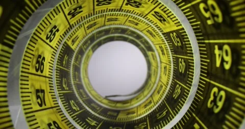 Yellow black tape measure on table for important measurements Vídeo Stock 270911243