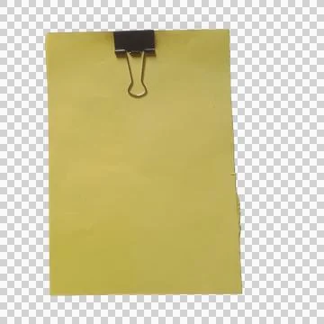 Yellow blank paper note held by a black metal binder clip isolated on a cle.. Фото