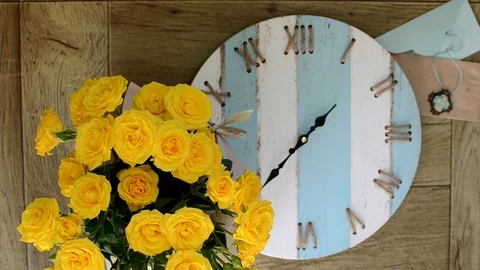 Yellow blue composition. Floral. Clock, roses bouquet. Vintage. Stock Footage 98702121