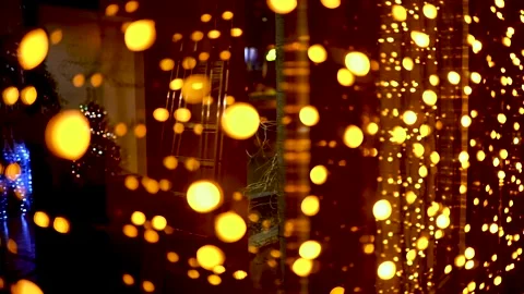 Yellow bokeh on a dark background Stock Footage 221413467