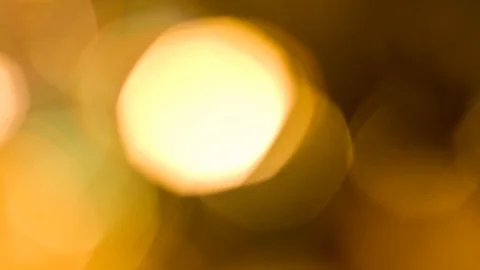 Yellow bokeh light effect abstract background, animation of sparkle circles Stock Footage 125614554