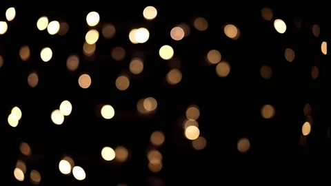 Yellow bokeh lights blur . new year's defocus. lights of the bokeh garland. Stock Footage 229939985