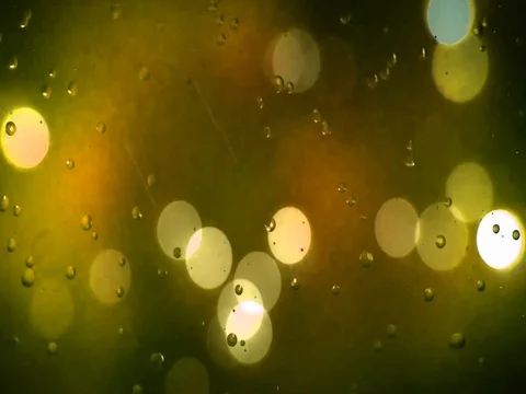 Yellow Bokeh with Rain 스톡 동영상 73619733