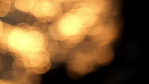 Yellow bokeh shape, sparkling sunlight in the lake water at sunset Stock Footage 280690838