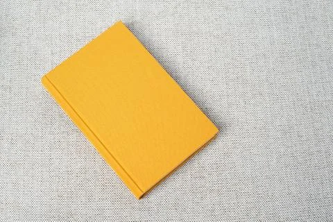 Yellow book on the table Stock Photos