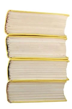Yellow books stack isolated Stock Photos