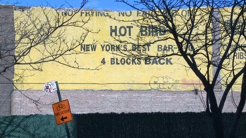 Yellow brick hot bird wall vanderbilt avenue brooklyn Stock Footage 87180152