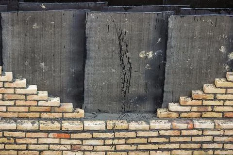 Yellow brick insulation wall background Stock Photos