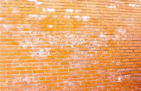 Yellow brick with snow Stock Photos