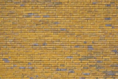 Yellow brick wall background Stock Photos