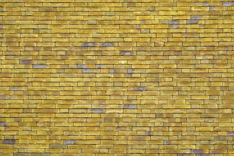 Yellow brick wall background Stock Photos