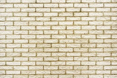 Yellow brick wall background Stock Photos