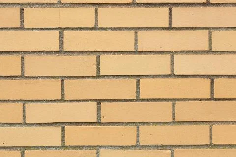Yellow Brick Wall Background Stock Photos
